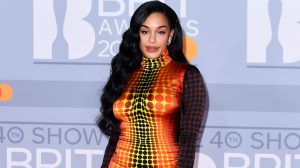 Jorja Smith wearing orange