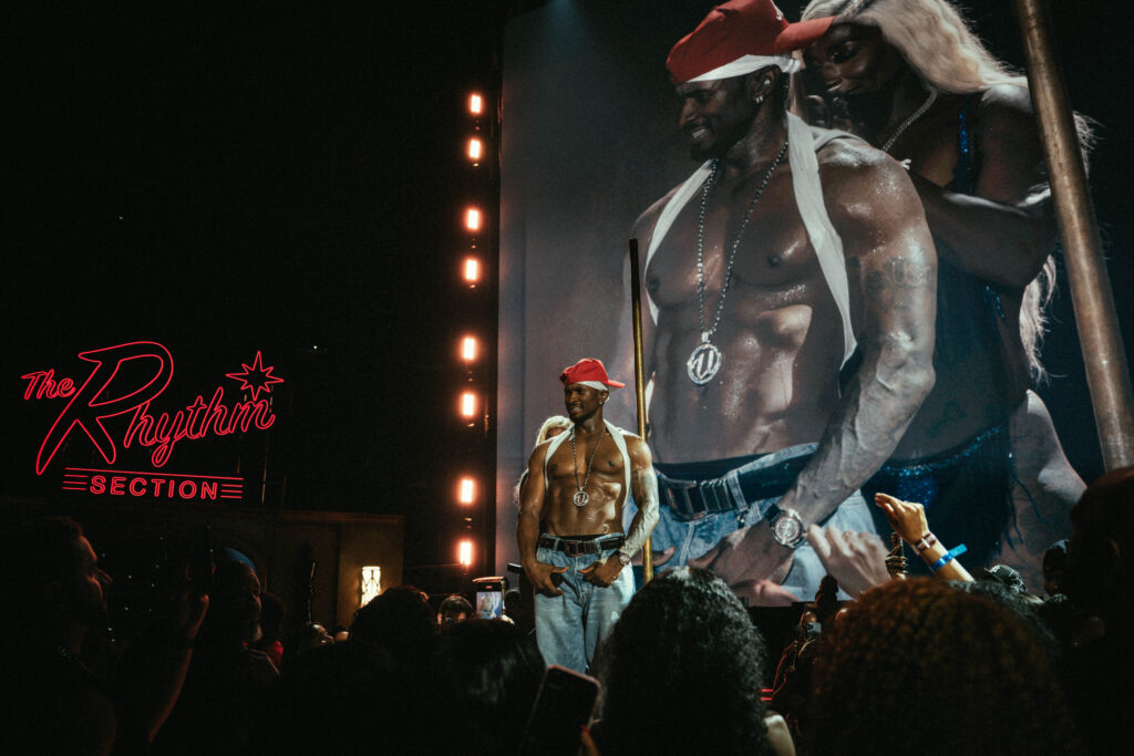A photo of Usher performing at Metlife Stadium on The R&B Tour